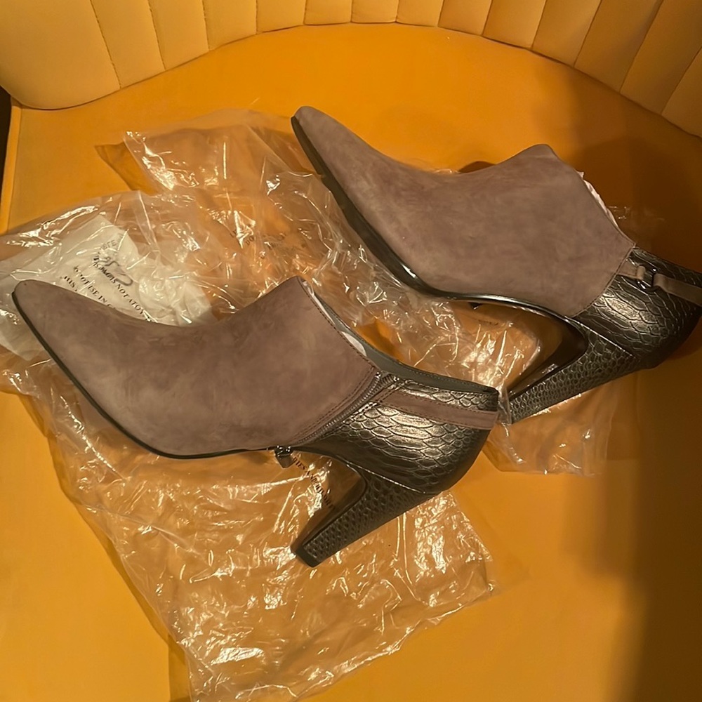 Never worn bronze booties